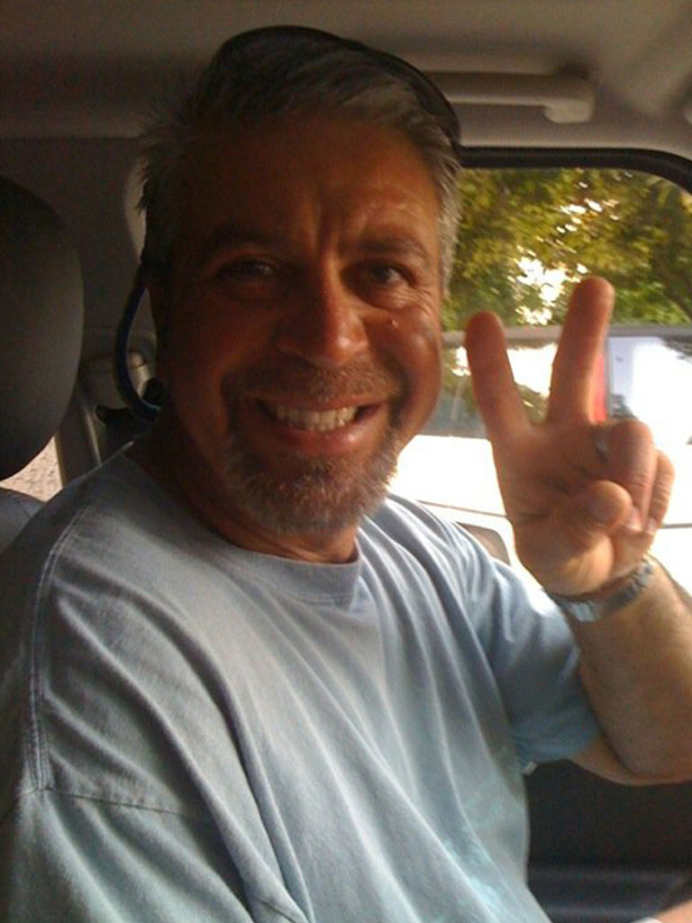 Giuseppe throwing a peace sign